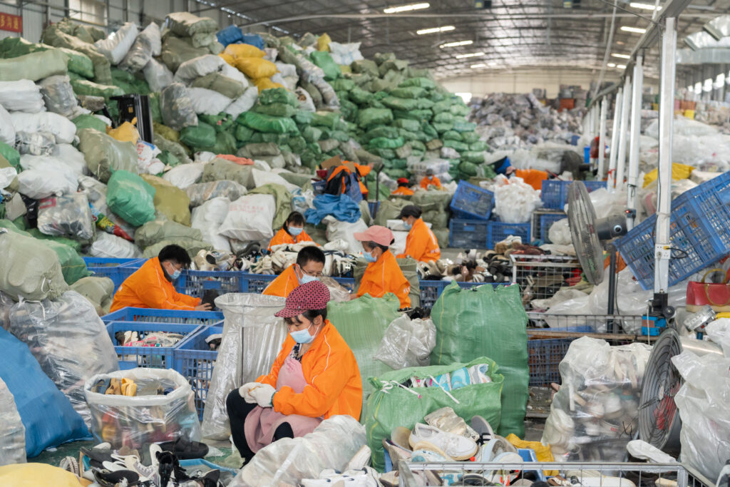 workers sorting shoes in the warehouse