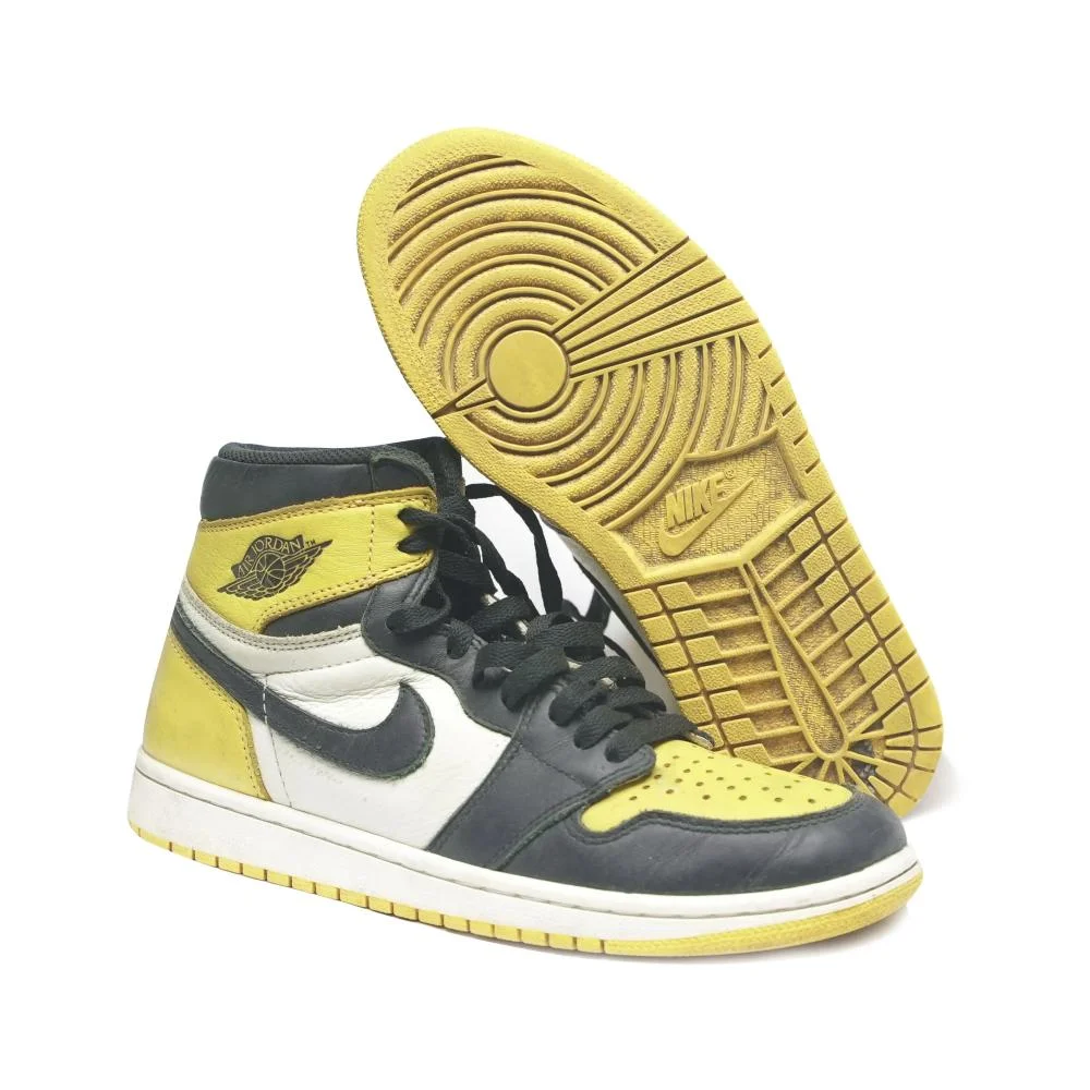 Black and yellow, high-top International used Nike basketball shoes